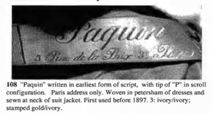 Shows the label of Paquin with the address written underneath.
