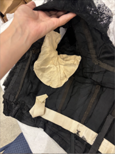 interior of bodice, can see where the structure was changed by the sleeve